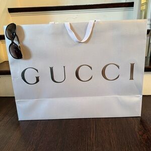 Gucci Extra Large Silver Shopping Bag. Sunglasses not for sale.